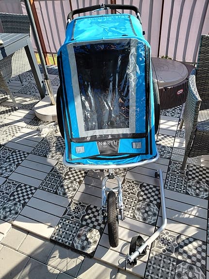 Blå cykelvagn/joggingvagn North 13.5 för 2 barn