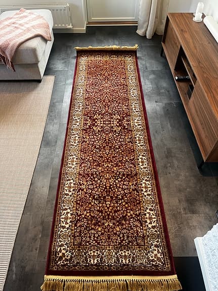 Rugvista röd gångmatta med orientaliskt mönster