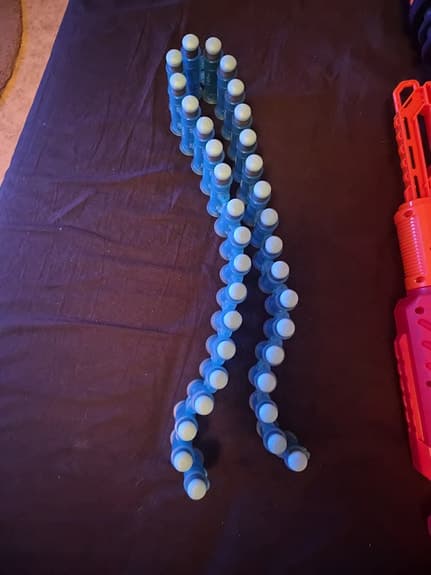 Nerf X-Shot leksaksvapen med blå skottband