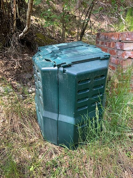 Grön kompostbehållare för trädgård