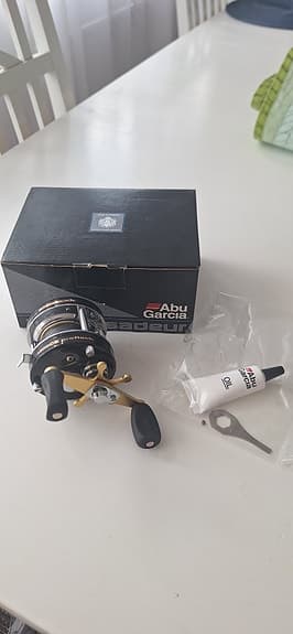 Abu Garcia Ambassadeur rulle svart/guld