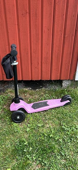 Rosa trehjuling sparkcykel för barn