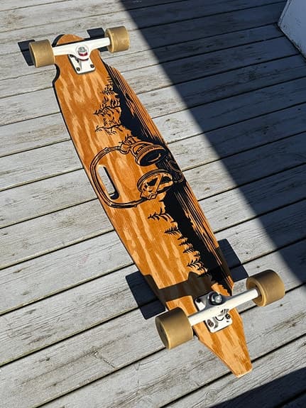 Montana longboard med bärhandtag
