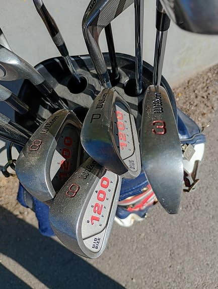Golfset med Wilson och Spalding Klubbor