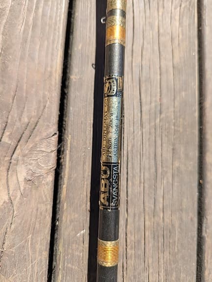 Abu Garcia Ambassadeur 5000 fiskespön med rullar svart/guld/röd