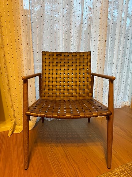A pair of Mio armchairs