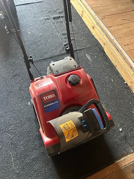 Toro Powerlite snöslunga röd