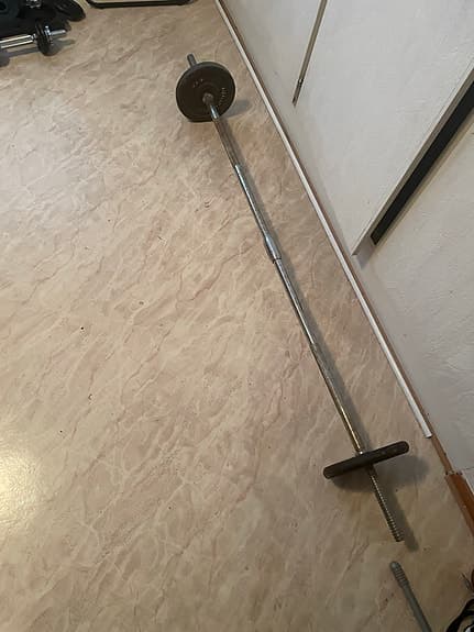 Hantelset och skivstång med vikter