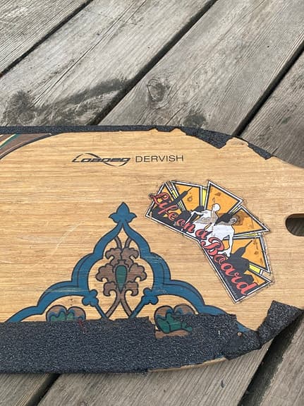 Loaded Dervish longboard med orange hjul