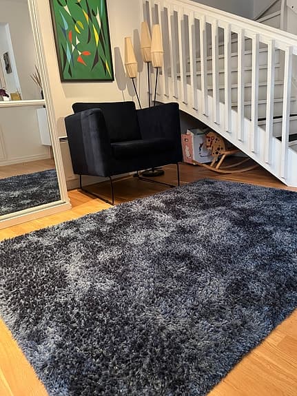Fåtölj med matchande matta
