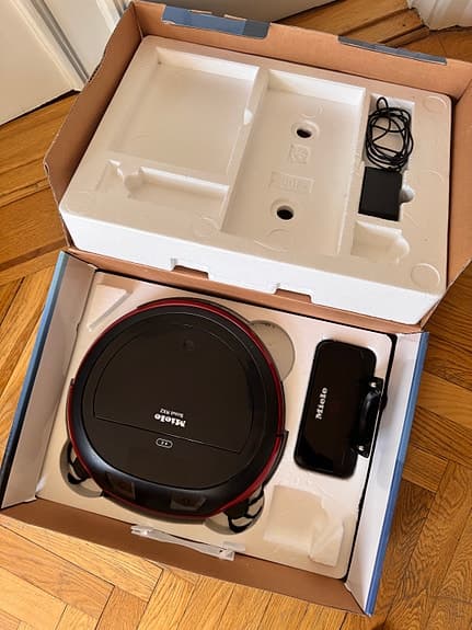 Miele Scout RX2 robotdammsugare svart/röd