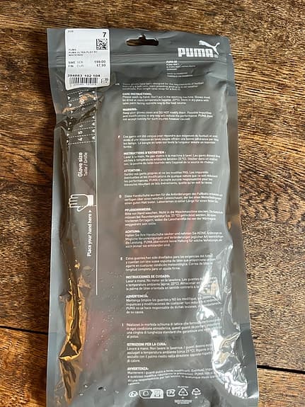 Oanvända Puma målvaktshandskar stl 7 vit/orange