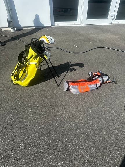 Golfklubbor med bärbagar