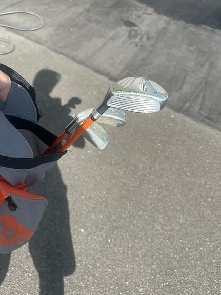 Golfklubbor med bärbagar