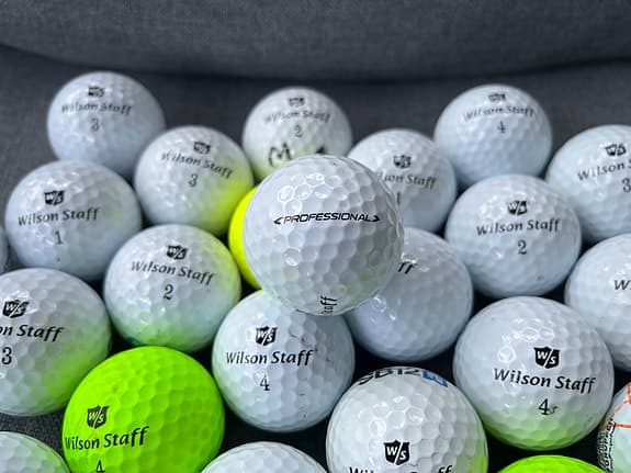 24 st Wilson Staff professional golfbollar i mkt bra skick
