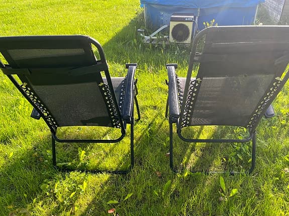 Svarta solstolar/relaxstolar med nackkudde