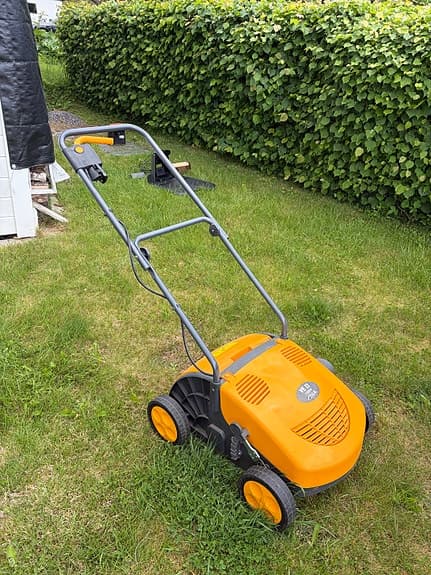 Stiga VE 32 1500W vertikalskärare/gåräfsare orange