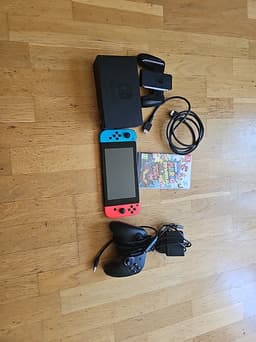 Nintendo Switch röda joycon funkar inte men det finns en kontroll och fler saker
