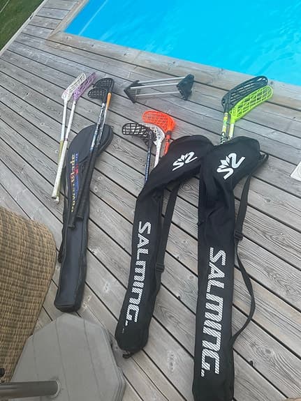 Innebandyklubbor med fodral och passare
