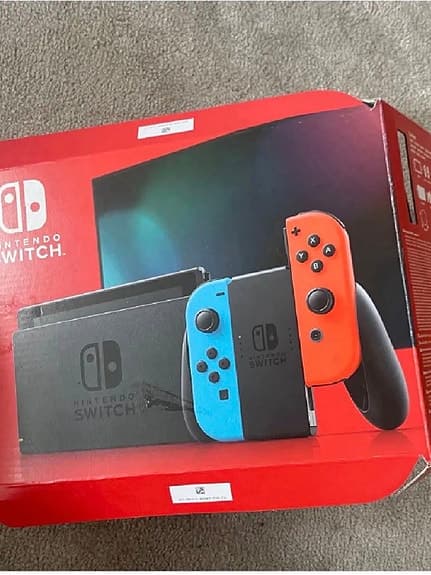 Nintendo Switch spelkonsol med blå/röd Joy-Con