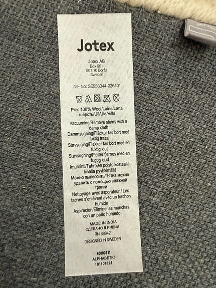 Jotex rund crémefärgad barnmatta med alfabet