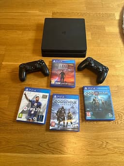 Sony PlayStation 4 konsol med handkontroller och spel