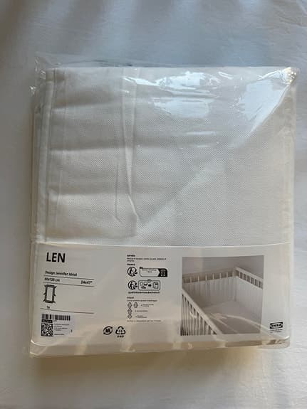 Unused Baby Crib with Mattress and Sheets