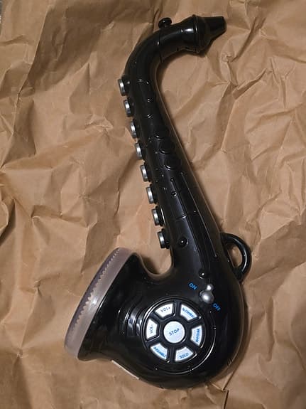 Leksak saxofon med ljud och melodier
