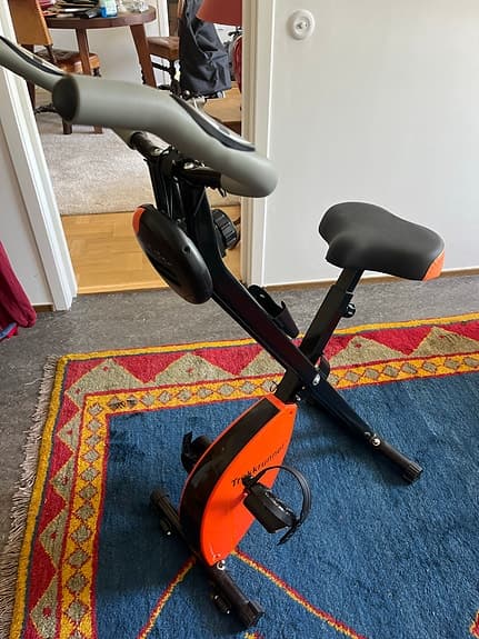Träningscykel hopfällbar svart/orange