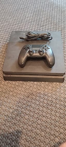 Sony PlayStation 4 spelkonsol med handkontroll