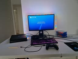 Sony PlayStation 4 Pro svart spelkonsol med handkontroll och spel