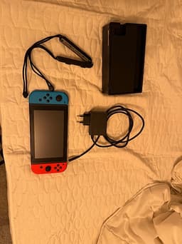 Nintendo Switch spelkonsol neon röd/blå