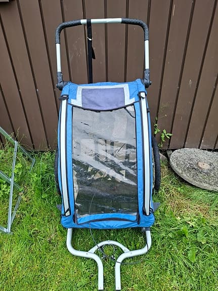 Blå cykelvagn/barnvagn med två hjul
