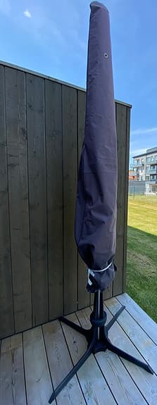 Parasoll med fot och vikt