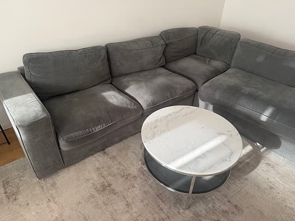 Mörkgrön hörnsoffa med divan