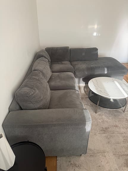 Mörkgrön hörnsoffa med divan