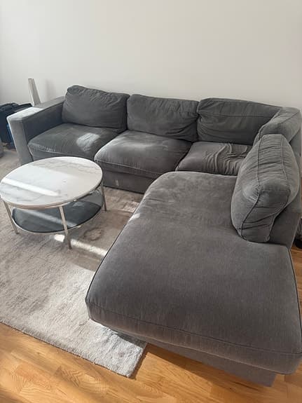 Mörkgrön hörnsoffa med divan