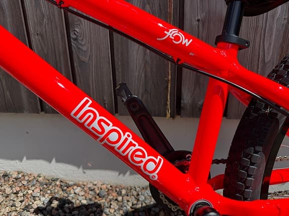 Trialcykel. Inspired Flow 24”, Gloss neon red.