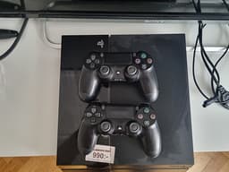 Sony PlayStation 4 spelkonsol med handkontroller