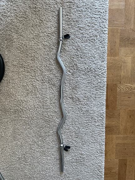 Curlstång 25 mm med klämmor.