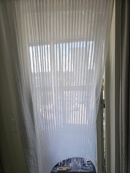en gardin längd med öljetter