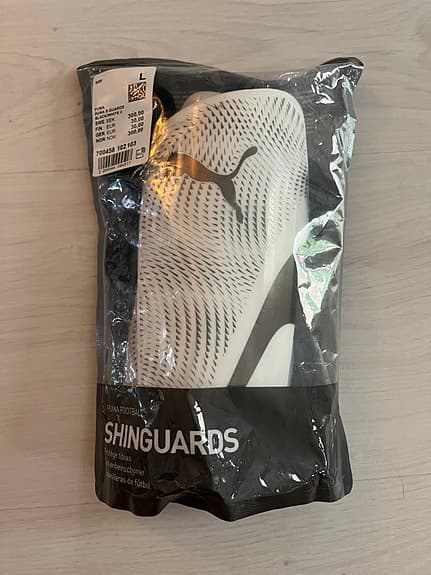 Puma benskydd vit/svart