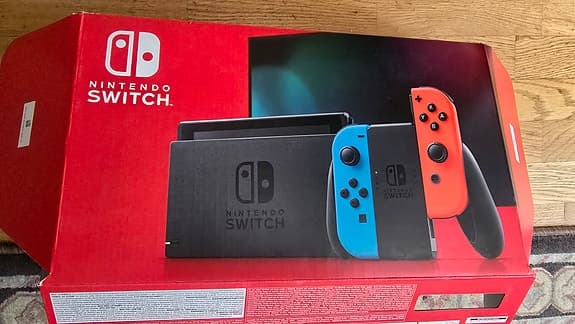 Nintendo Switch – Mycket fint skick, knappt använd + spel och handkontroll