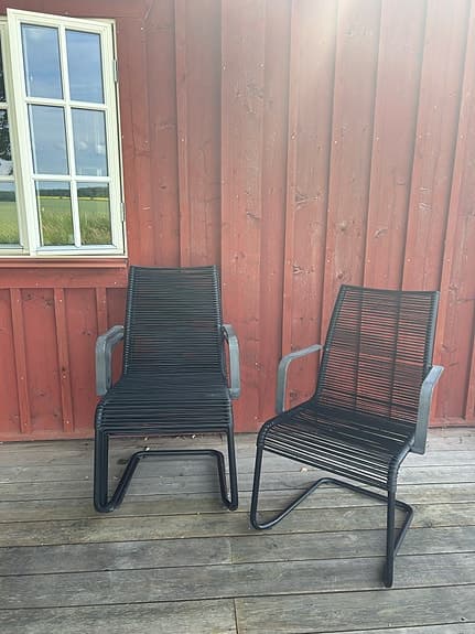 Svarta utestolar med armstöd - IKEA Väsman