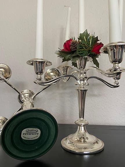 Två stycken Duka silver ljusstakar.
