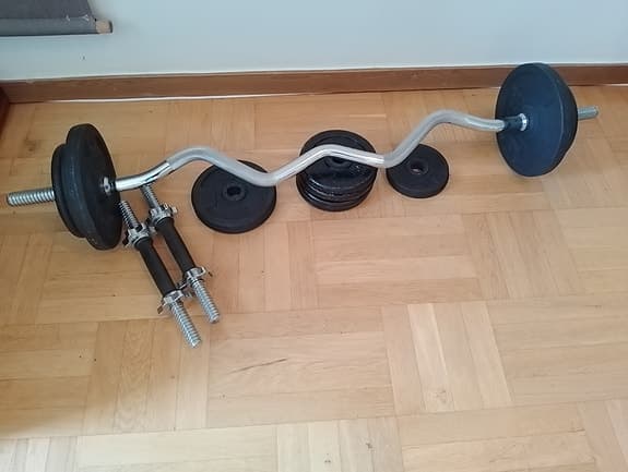 Skivstång och hantlar med vikter