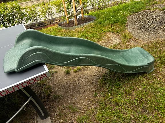Grön rutschkana för lekställning