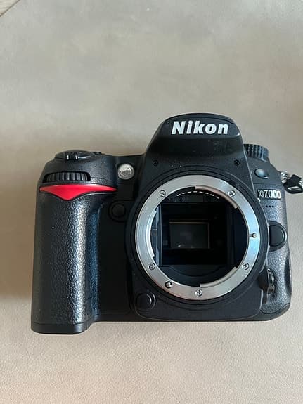 Nikon D7000 systemkamera med två objektiv och tillbehör