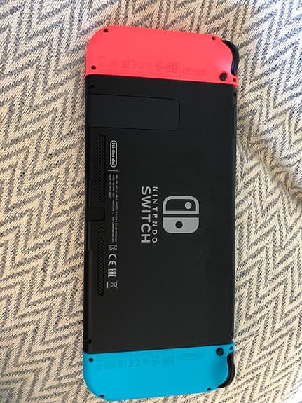 Nintendo Switch spelkonsol neon röd/blå