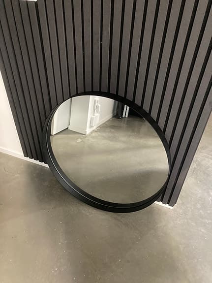 Åhléns Home rund spegel med svart ram
